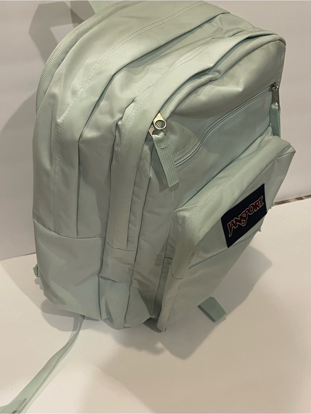 Jansport Pastel Mint Green Backpack with Front Logo Pocket - Picture 2 of 3